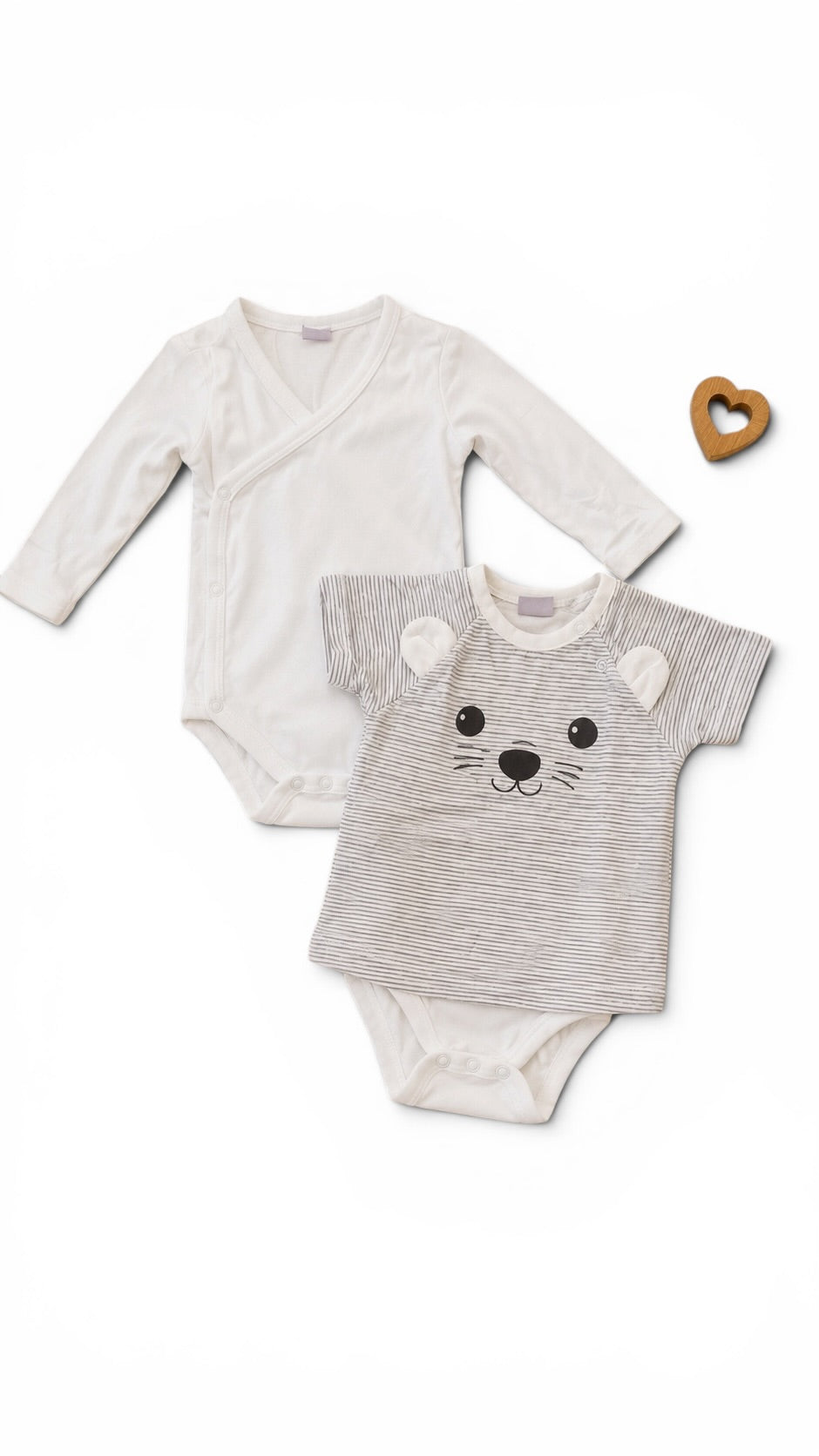 2 niedliche Babybodys im Set