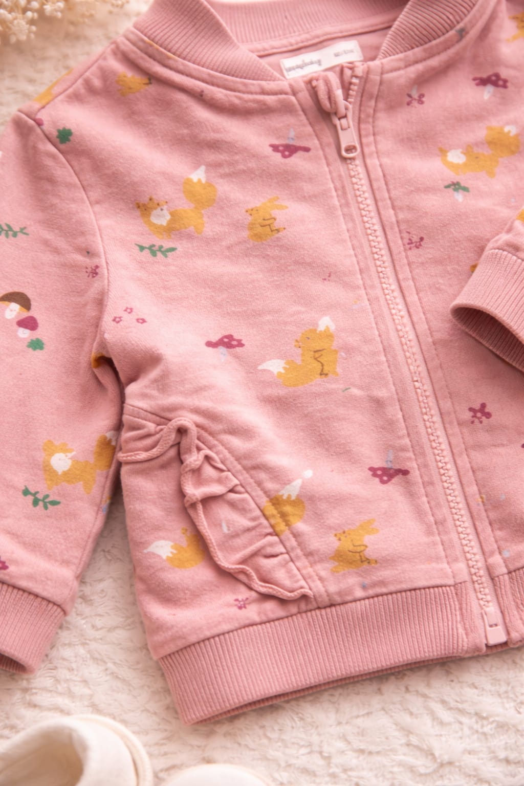 Enchanting woodland animal baby jacket – cozy & playful all in one